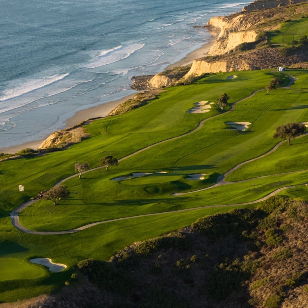 Aerial fairways and bunkers along the Torrey Pines coastal bluffs